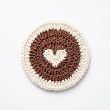 [BerryBow Canonical] BB-COS-NAT-BRN-01 | Hero | Coffee Heart Crochet Coaster – Handmade by Berry Bow