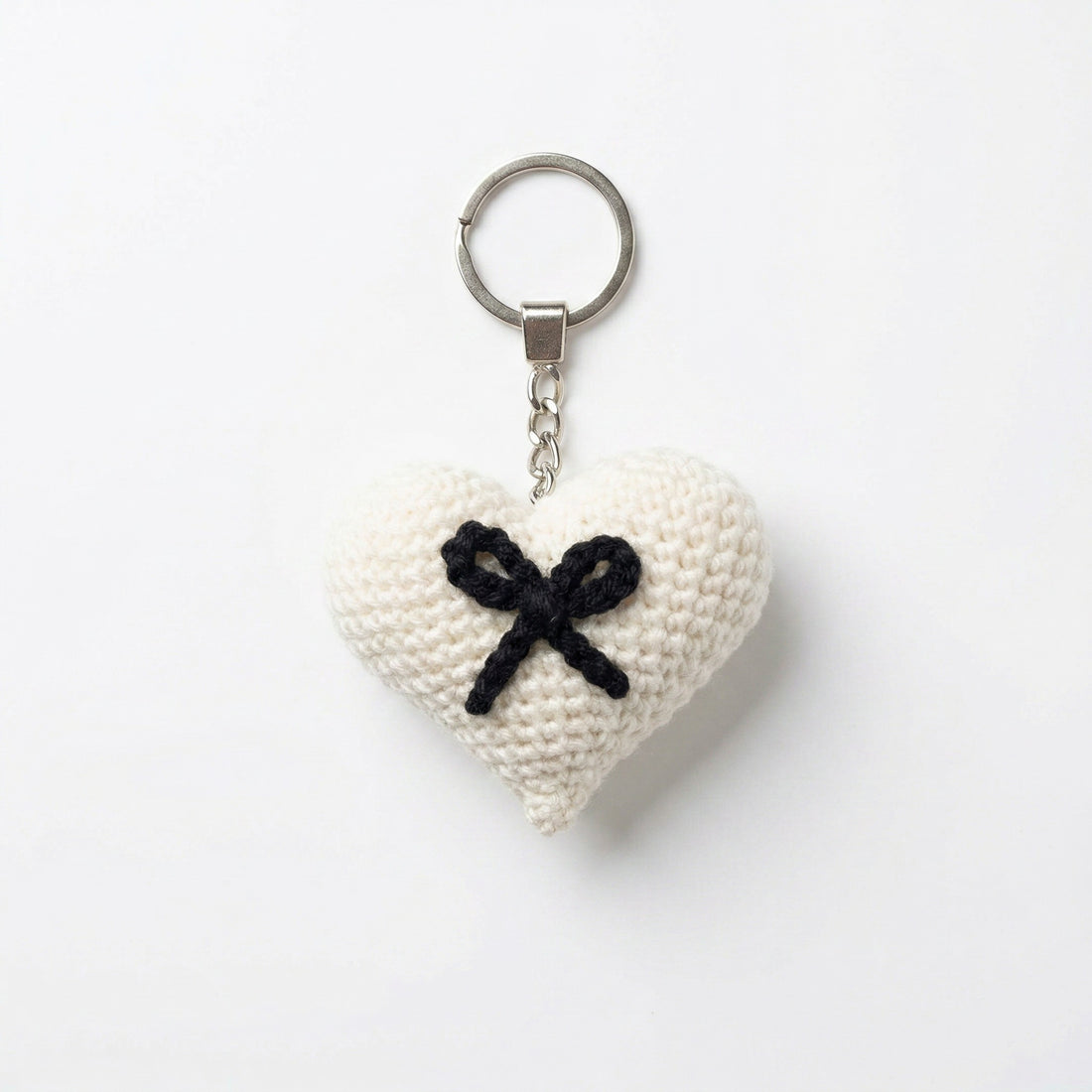 [BerryBow Canonical] BB-KC-HRT-WHT-01 | Hero | Black Bow Heart Crochet Keychain – Handmade by Berry Bow