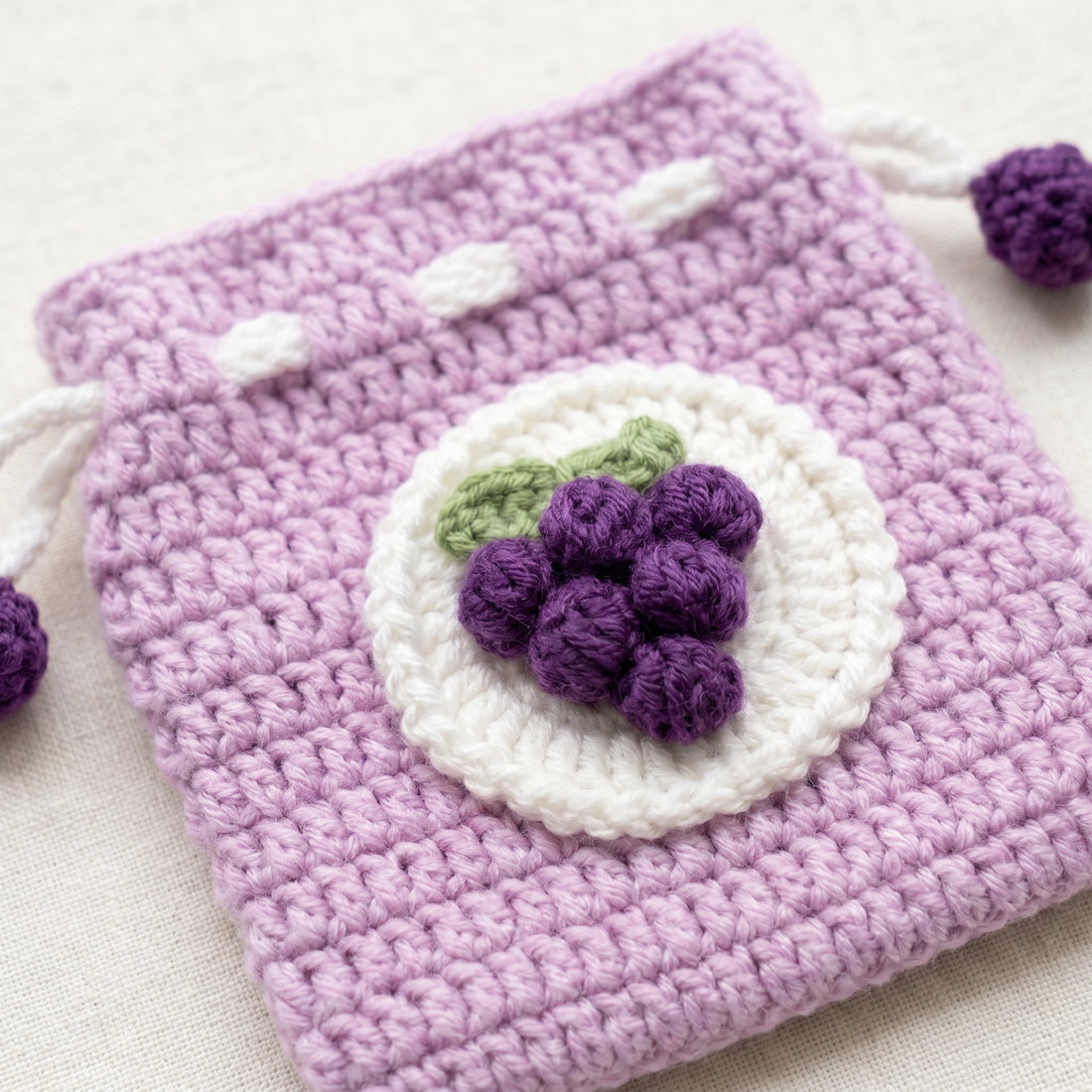 [BerryBow Canonical] BB-POU-PUR-GRP-04 | Hero | Purple Grapes Crochet Pouch – Handmade by Berry Bow