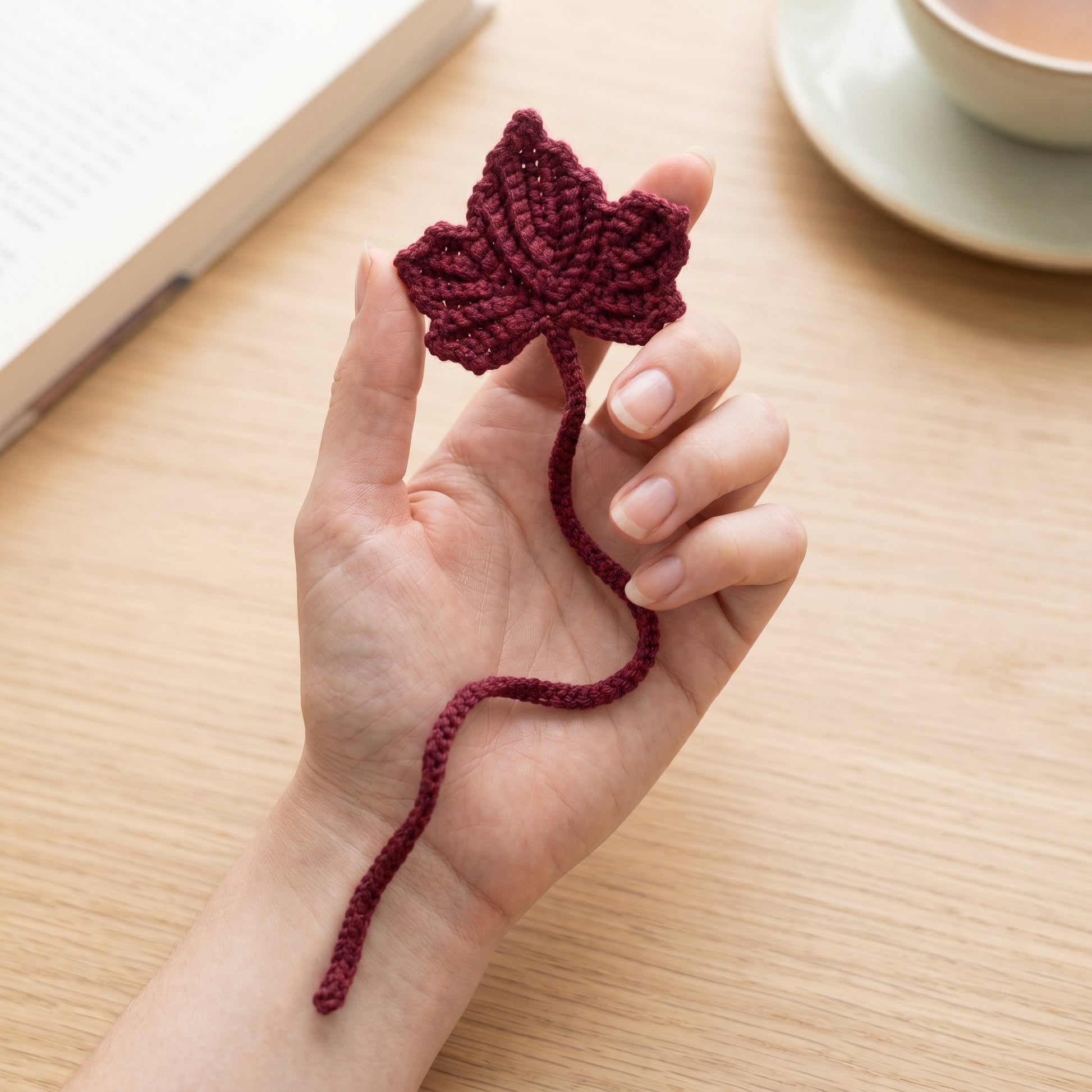 [BerryBow Canonical] BB-BM-LEF-BUR-01 | Scale | Burgundy Leaf Crochet Bookmark – Handmade by Berry Bow